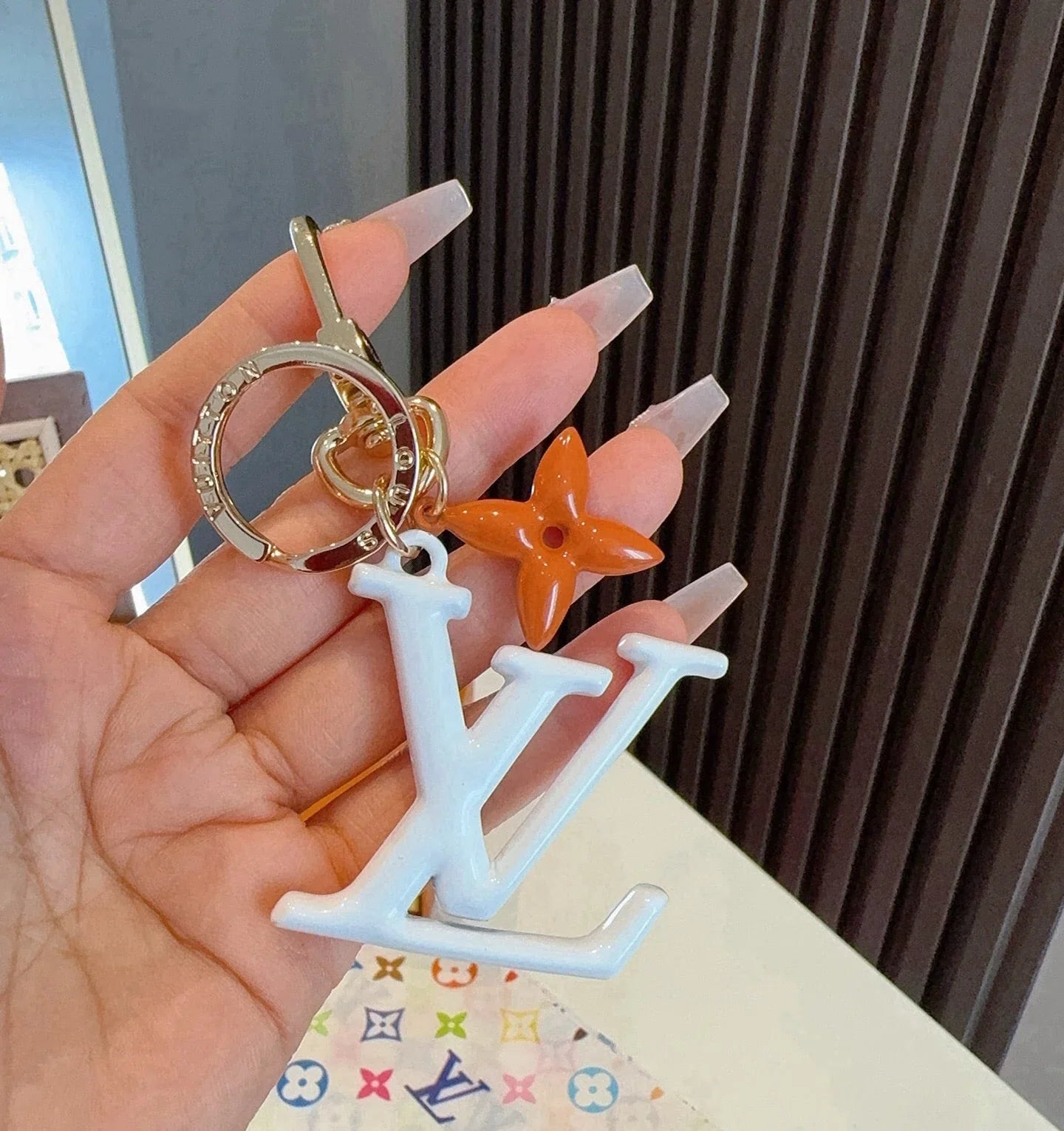 LV Logo Charm 415613